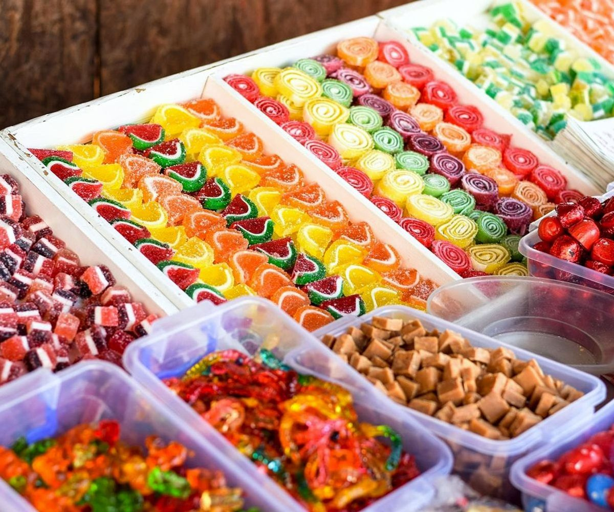 Master confectioners crafting premium lollipops by hand
